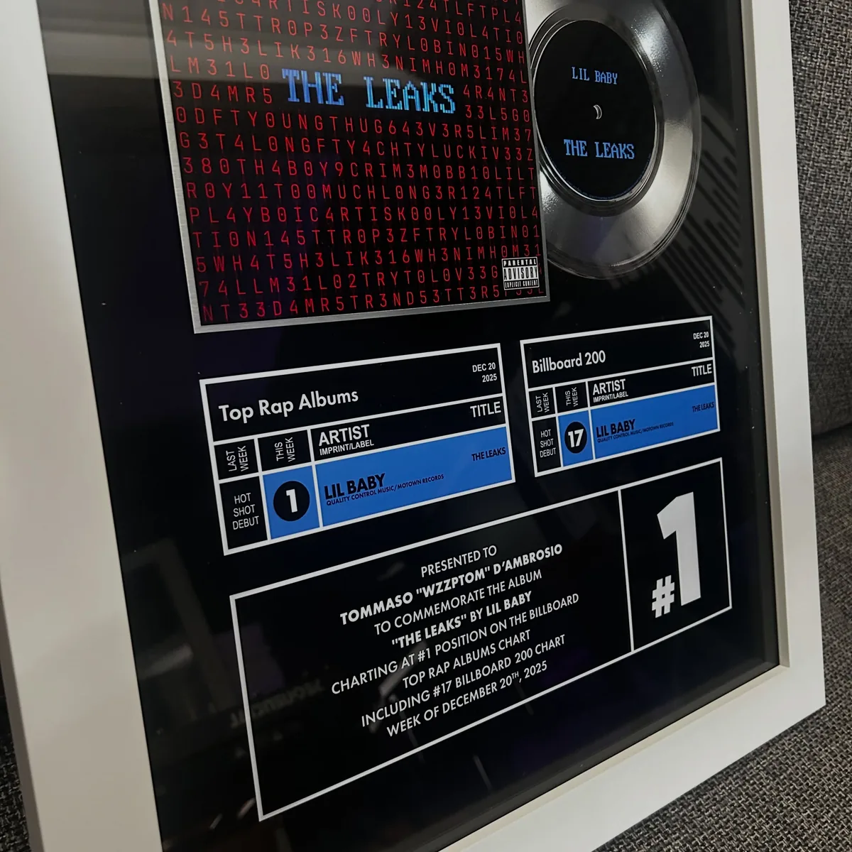 Billboard #1 plaque for Lil Baby's The Leaks, presented to Tommaso “Wzzptom” D'Ambrosio
